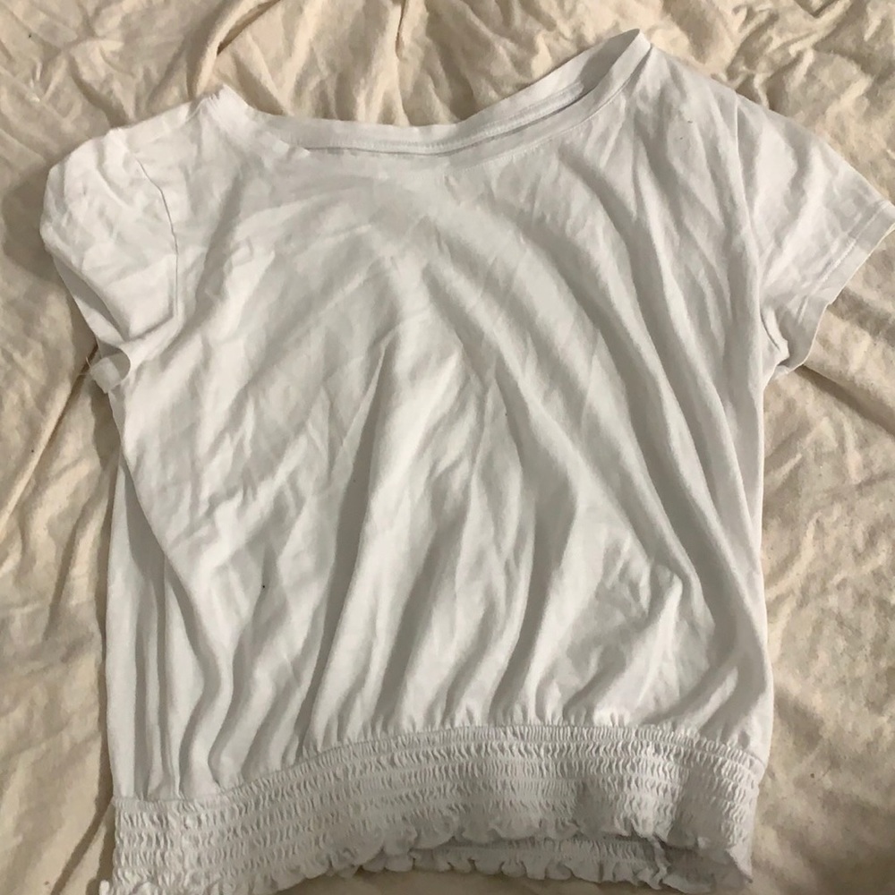 White cute shirt with sleeves , elastic at bottom